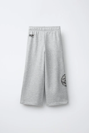 Брюки  из мягкой ткани с принтом шара для бильярда- Заказать в России