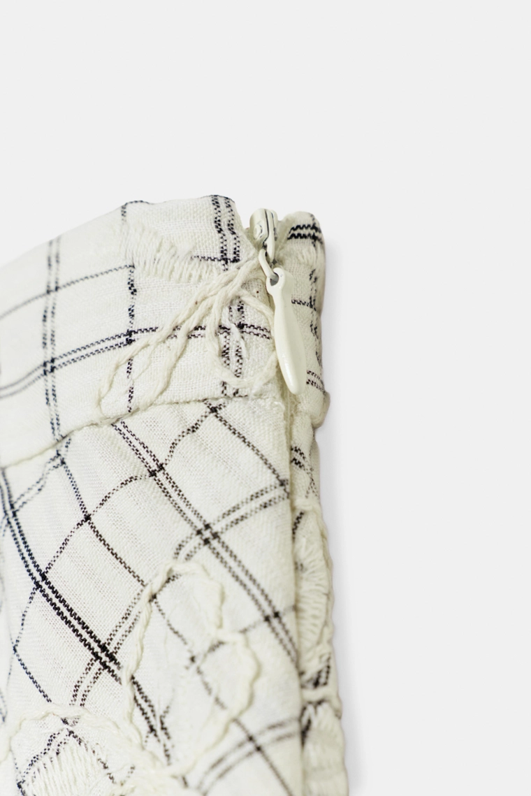 Юбка в клетку с вышивкой и бантами