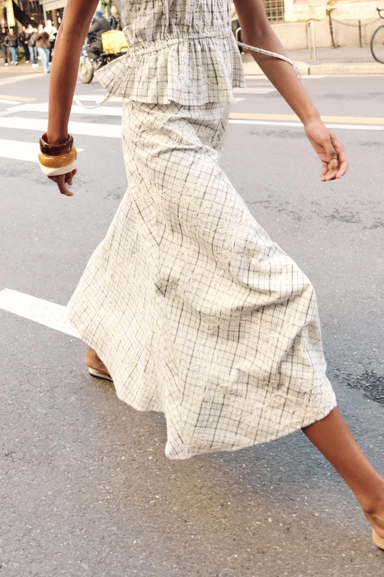 Юбка в клетку с вышивкой и бантами