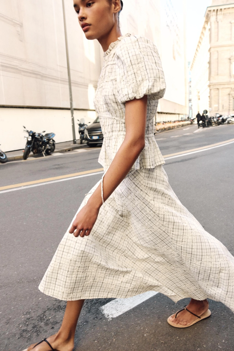 Юбка в клетку с вышивкой и бантами