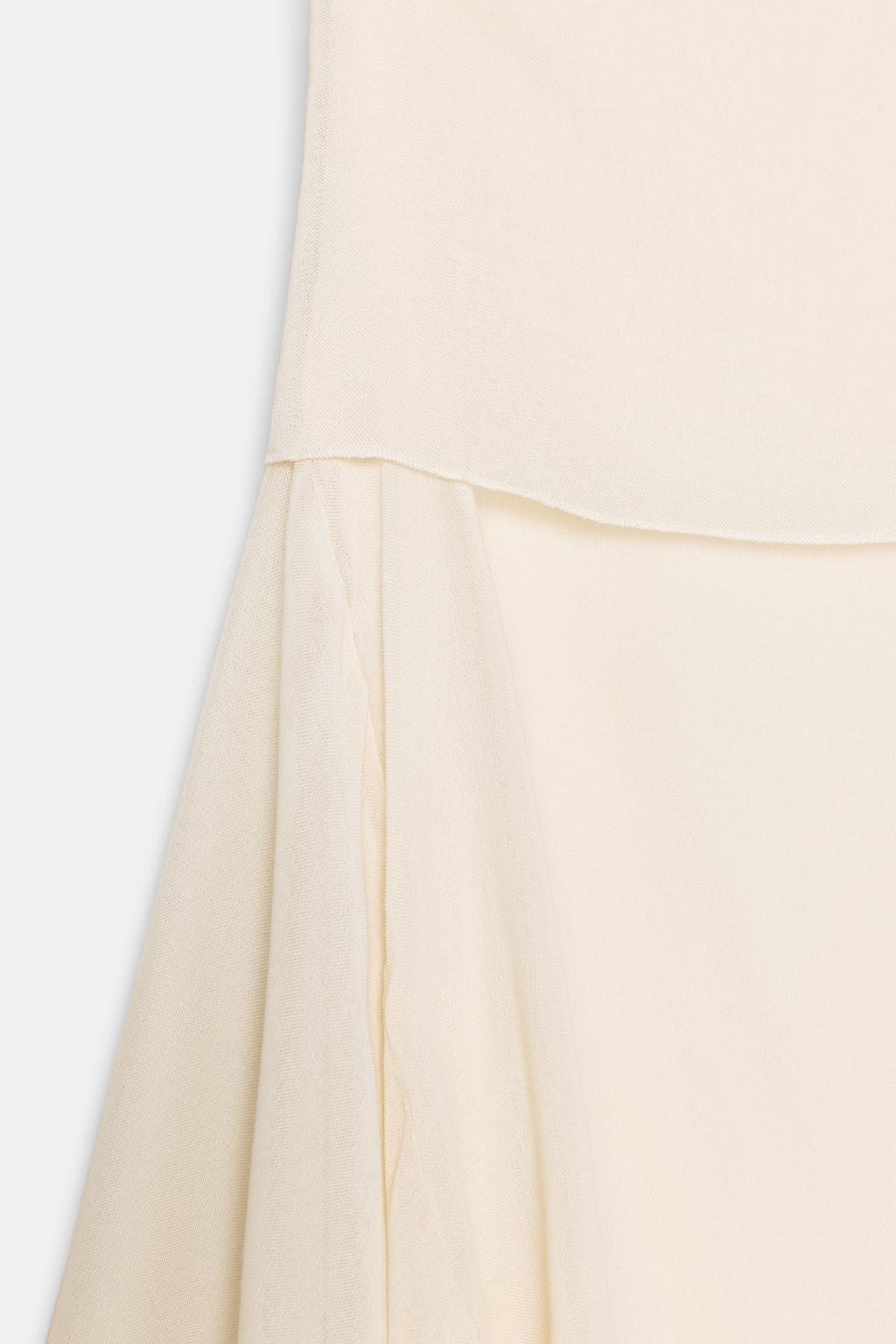 СТРУЯЩАЯСЯ ЮБКА АСИММЕТРИЧНОГО КРОЯ