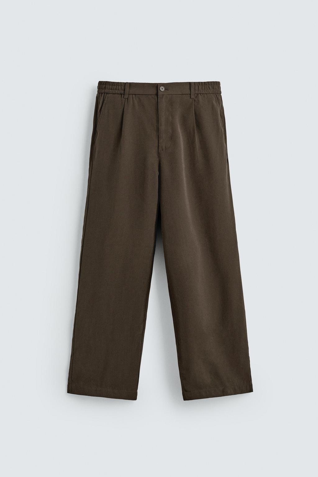 БРЮКИ  ИЗ СТРУЯЩЕЙСЯ ТКАНИ