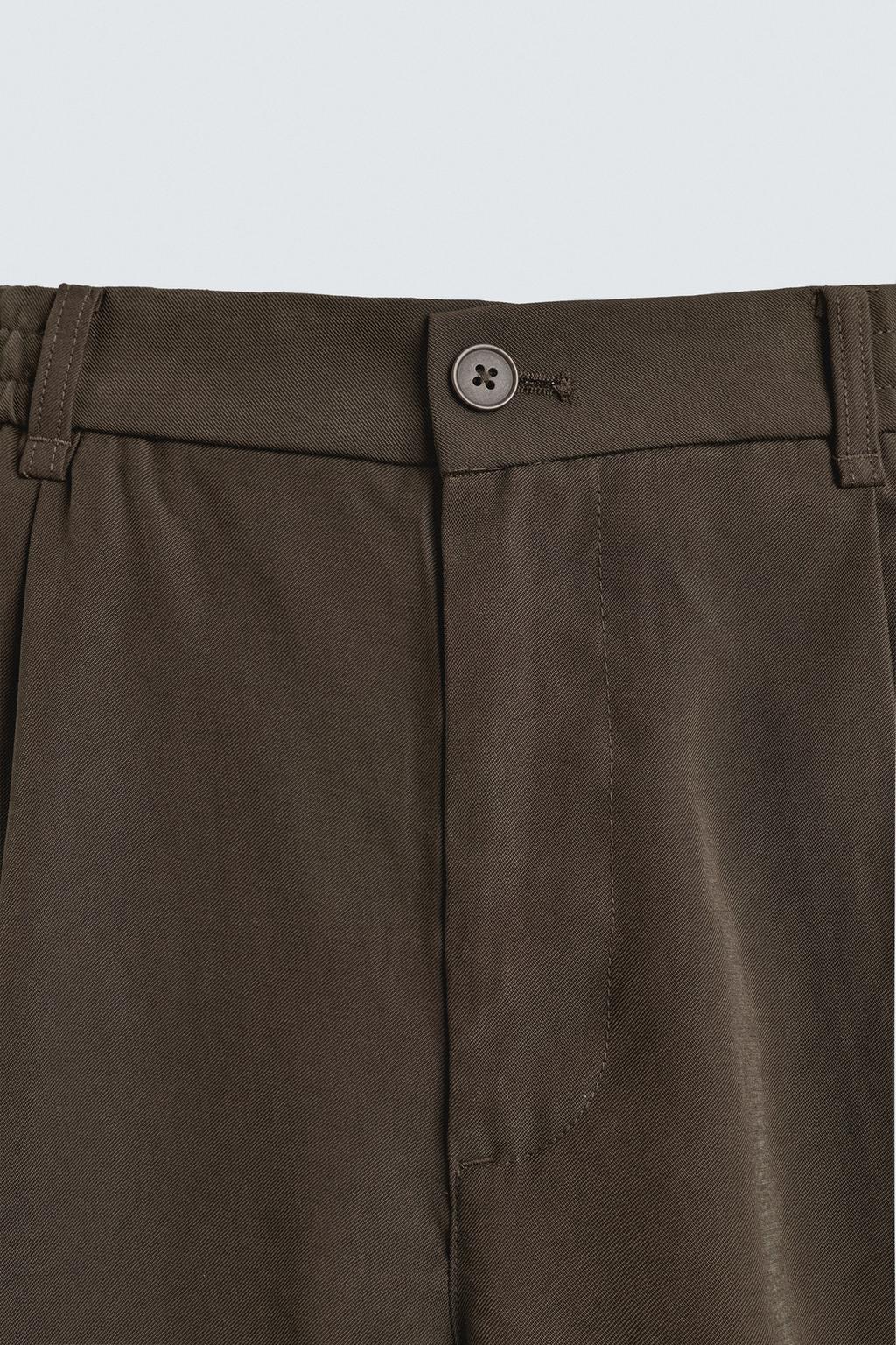 БРЮКИ  ИЗ СТРУЯЩЕЙСЯ ТКАНИ