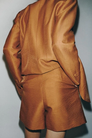 Шорты из льна с обтянутой пуговицей- Заказать в России