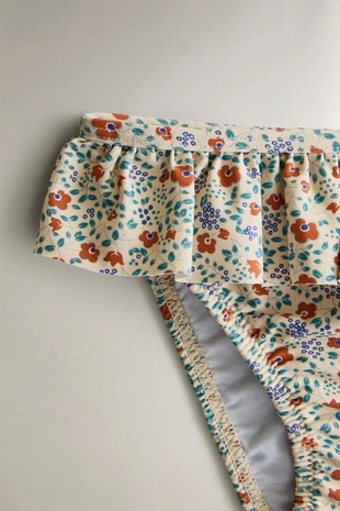 Детские плавки для пляжа с тропическими цветочными оборками- Заказать в России