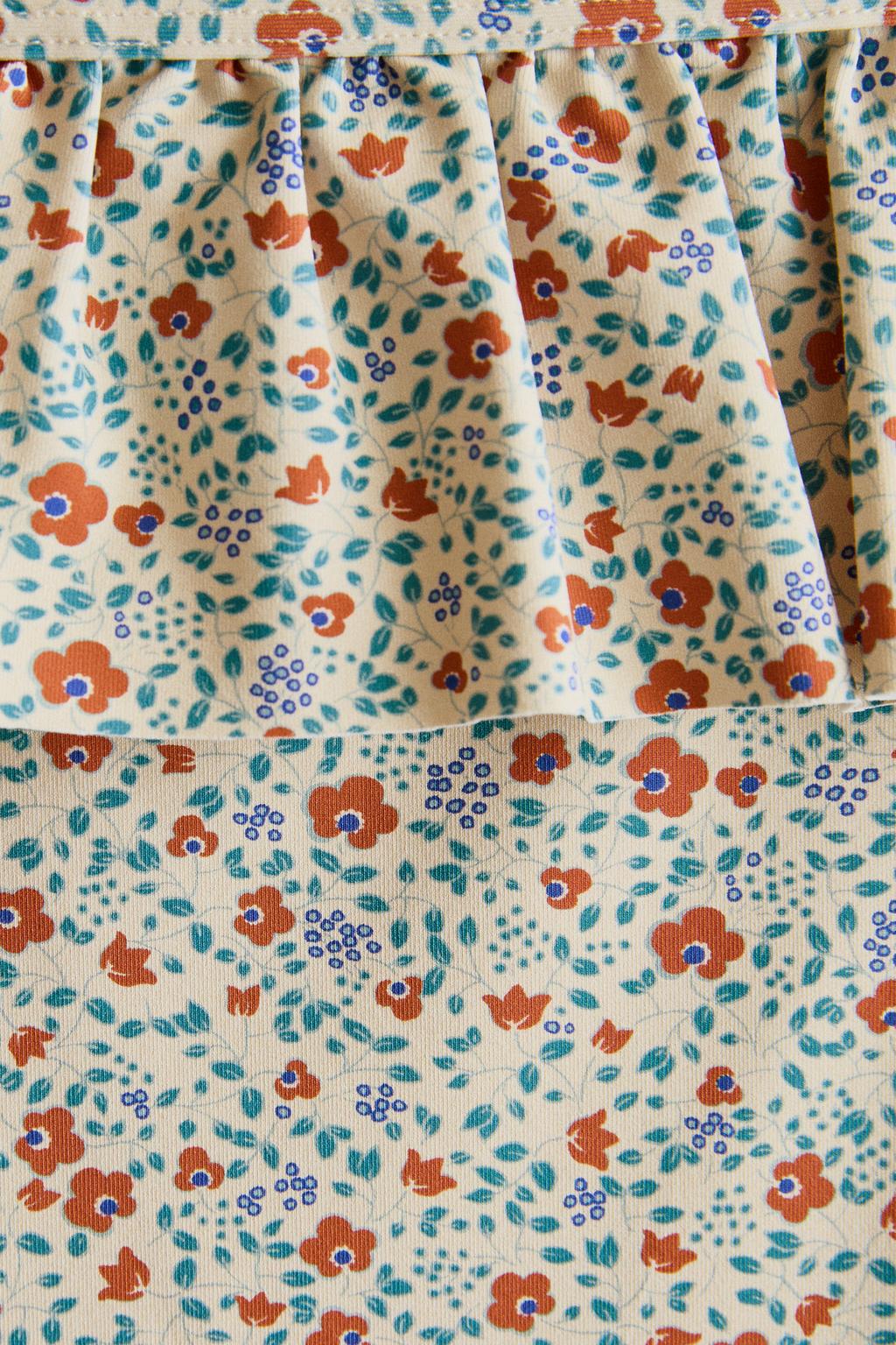 Детский купальник с цветочными оборками для пляжа