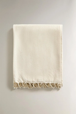 Хлопковое пляжное полотенце с бахромой