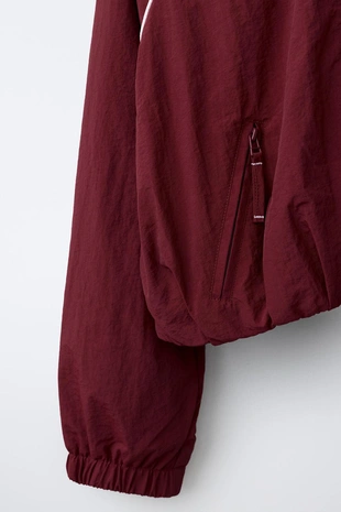 Спортивная куртка с контрастными деталями- Заказать в России