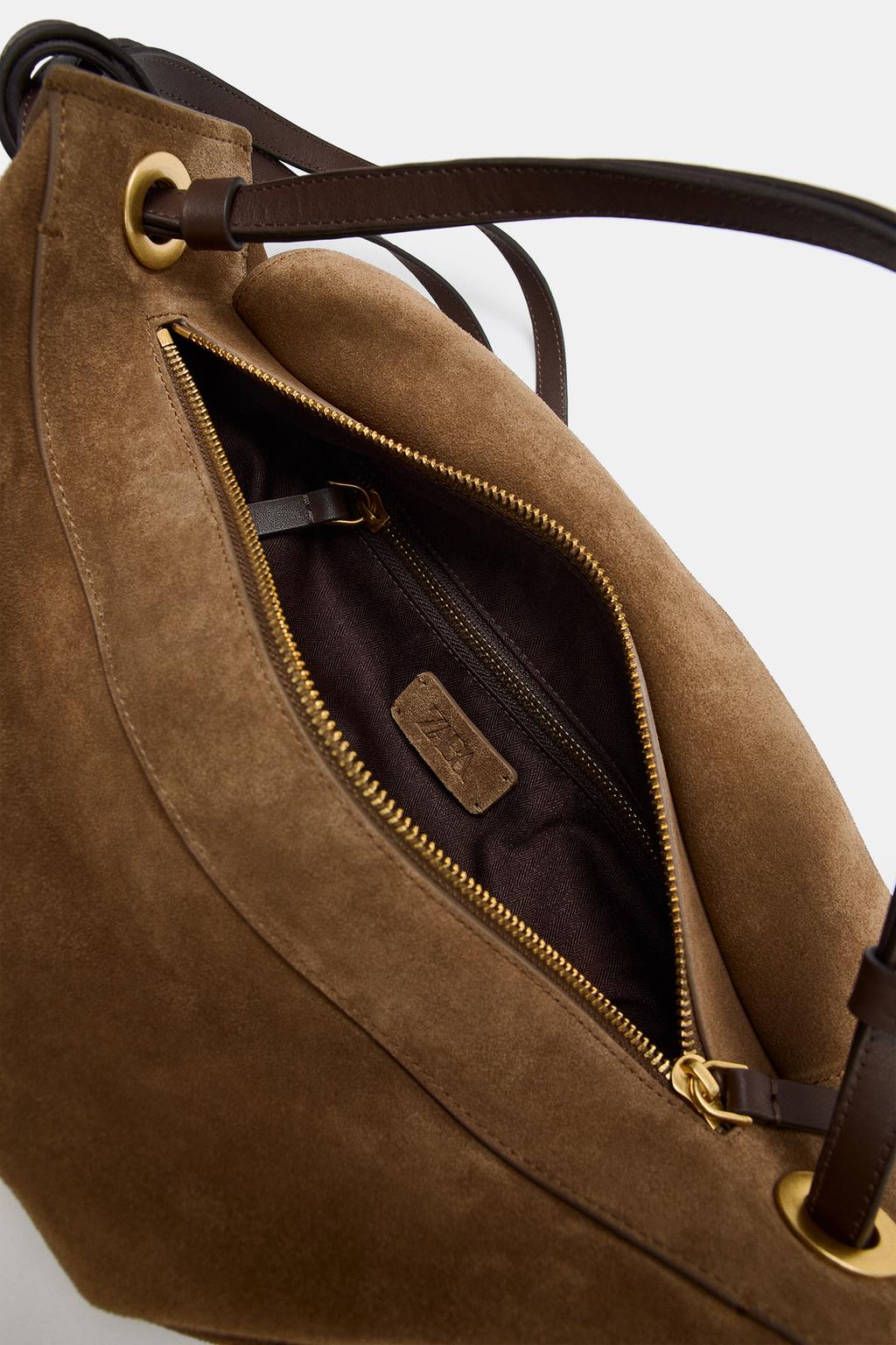 УДЛИНЕННАЯ КОЖАНАЯ СУМКА-МЕШОК