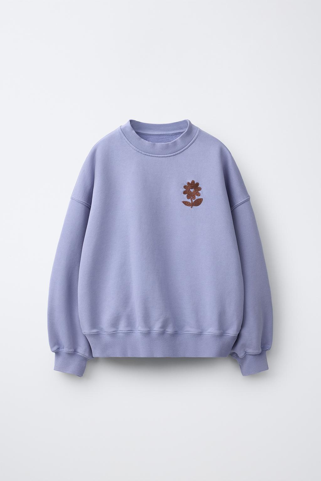 ТОЛСТОВКА С ВЫШИТЫМ ЦВЕТКОМ