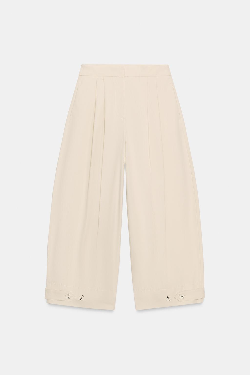 БРЮКИ  С РЕГУЛИРУЕМЫМ НИЗОМ