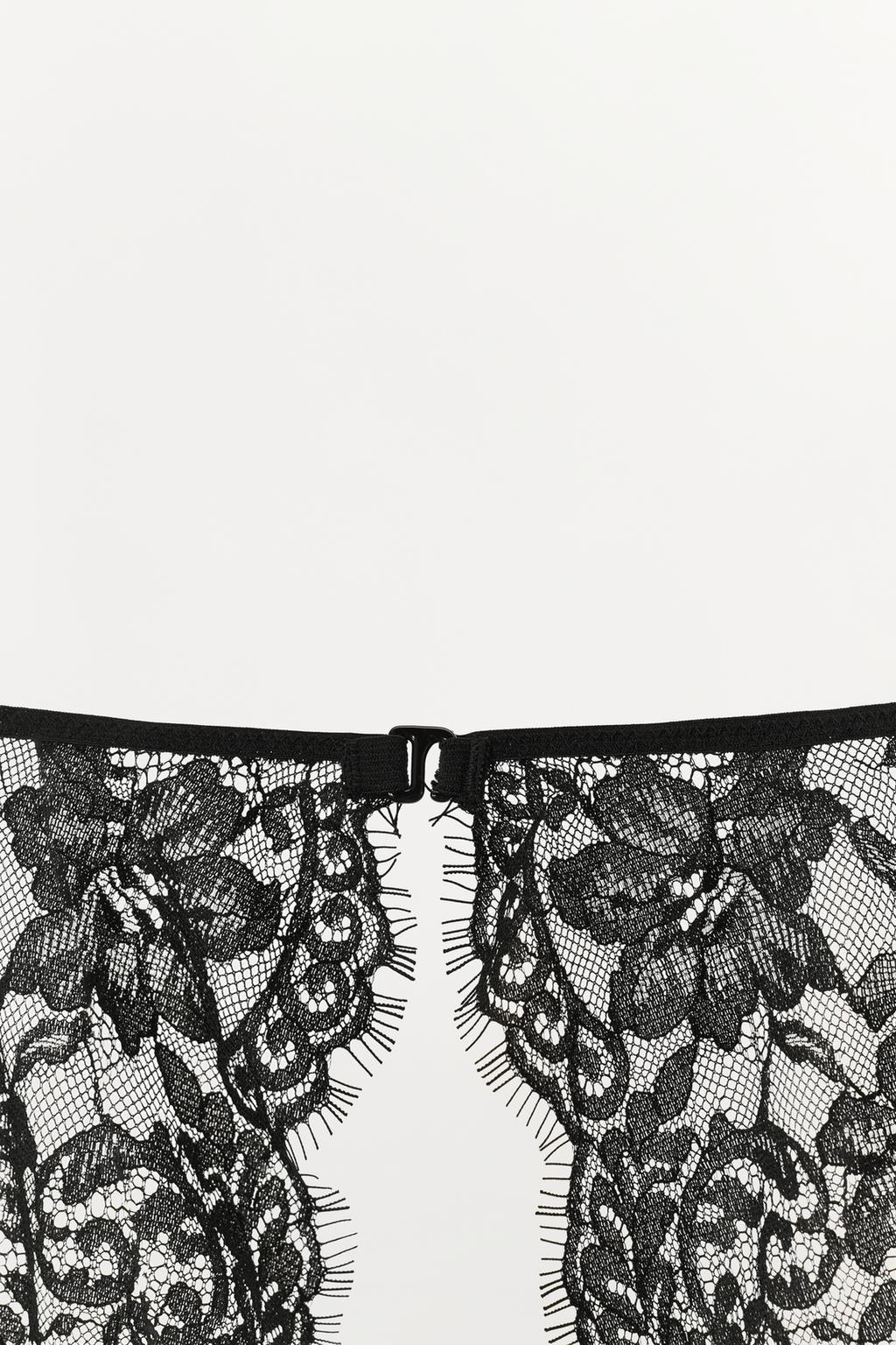 КРУЖЕВНОЙ БЮСТГАЛЬТЕР С РУКАВАМИ И КОСТОЧКАМИ