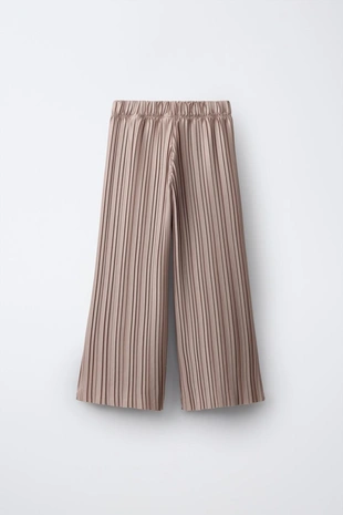 Плиссированные брюки - Заказать в России