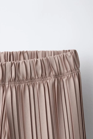 Плиссированные брюки - Заказать в России