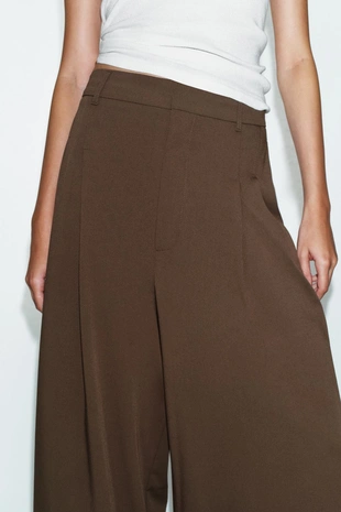 Широкие брюки с защипами- Заказать в России