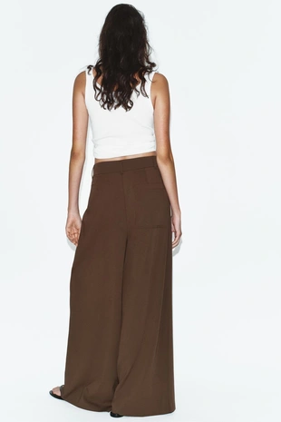 Широкие брюки с защипами- Заказать в России