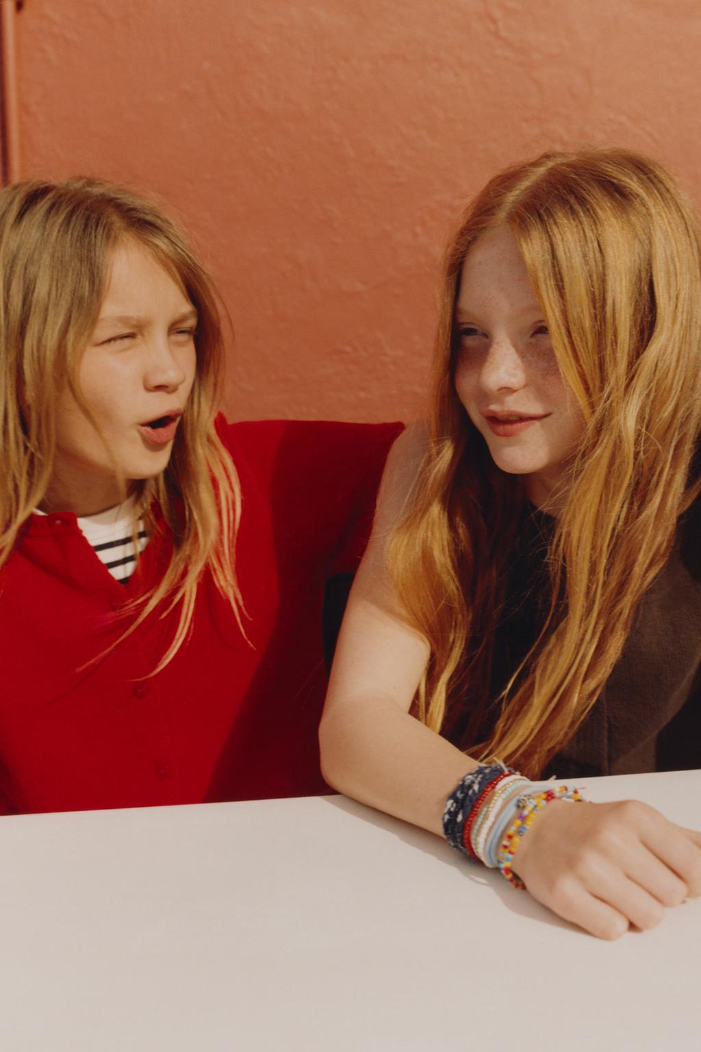 ТРИКОТАЖНЫЙ ЖИЛЕТ С ПУГОВИЦАМИ