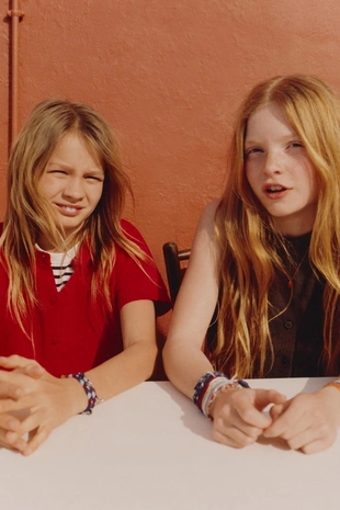 Трикотажный жилет с пуговицами- Заказать в России