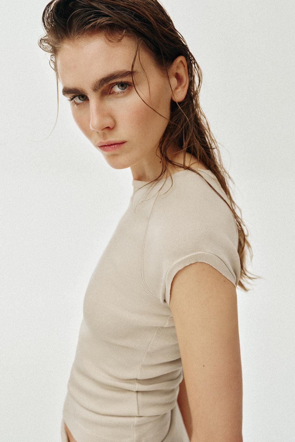 ФУТБОЛКА С ЭФФЕКТОМ ПОТЕРТОСТИ И РЕГЛАНОМ