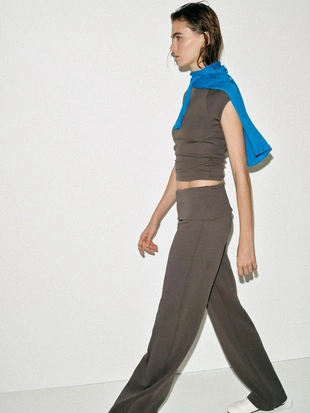 Футболка с эффектом потертости и регланом- Заказать в России