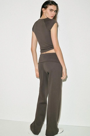 Брюки из ткани интерлок с эффектом потертости