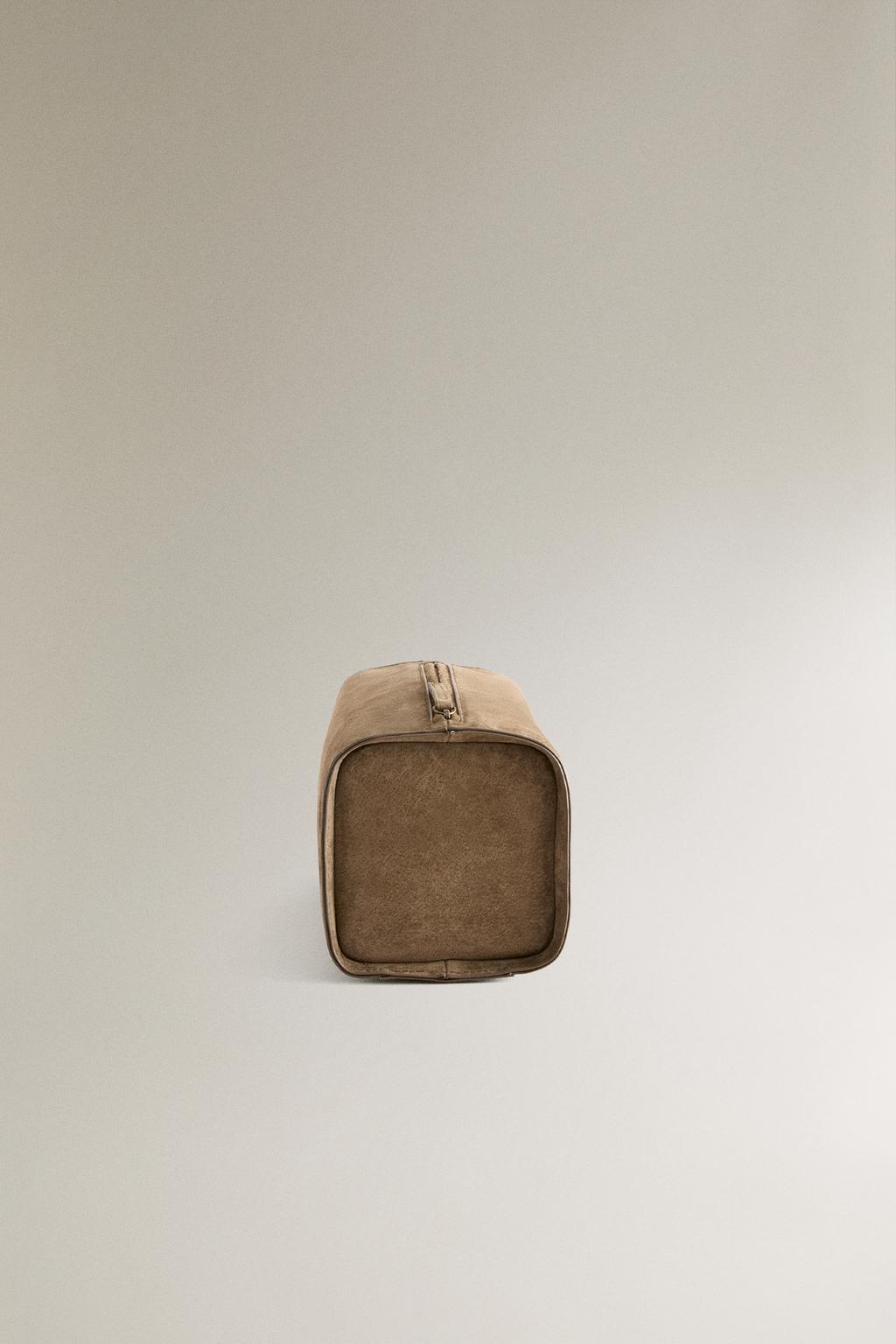 Кожаная косметичка