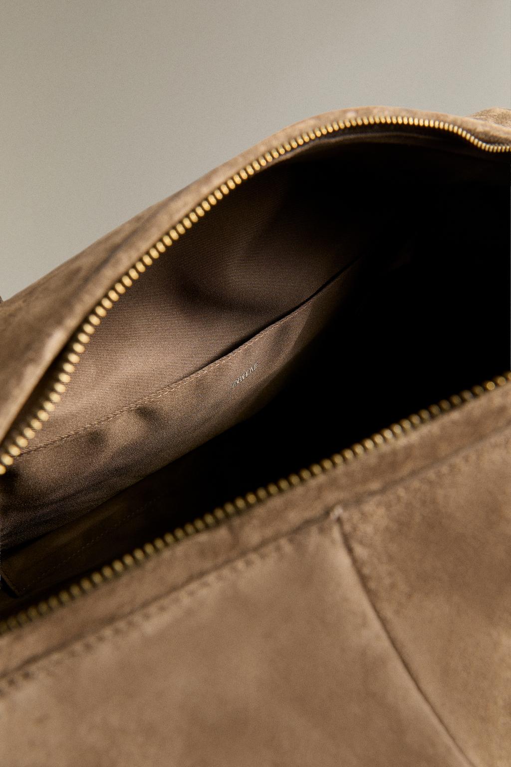 Кожаная сумка для путешествий