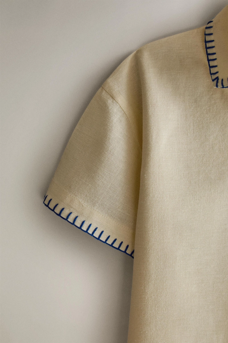 Детское пляжное поло с вышивкой stitch