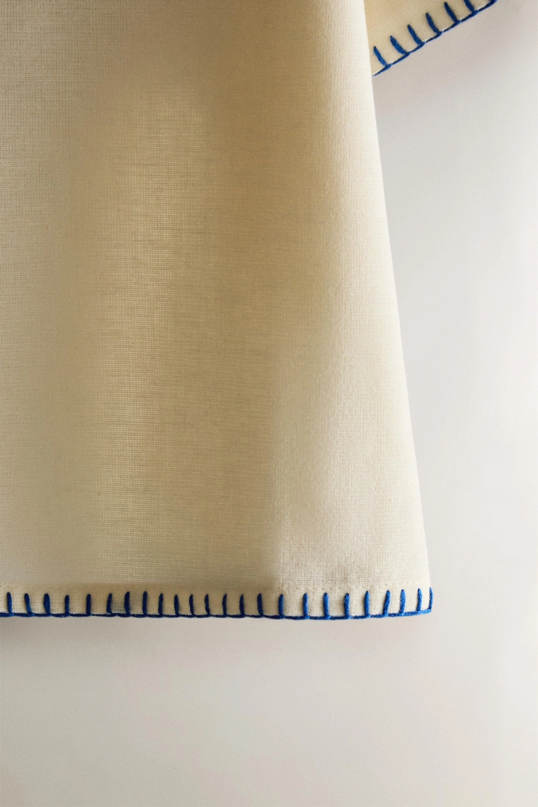 Детское пляжное поло с вышивкой stitch