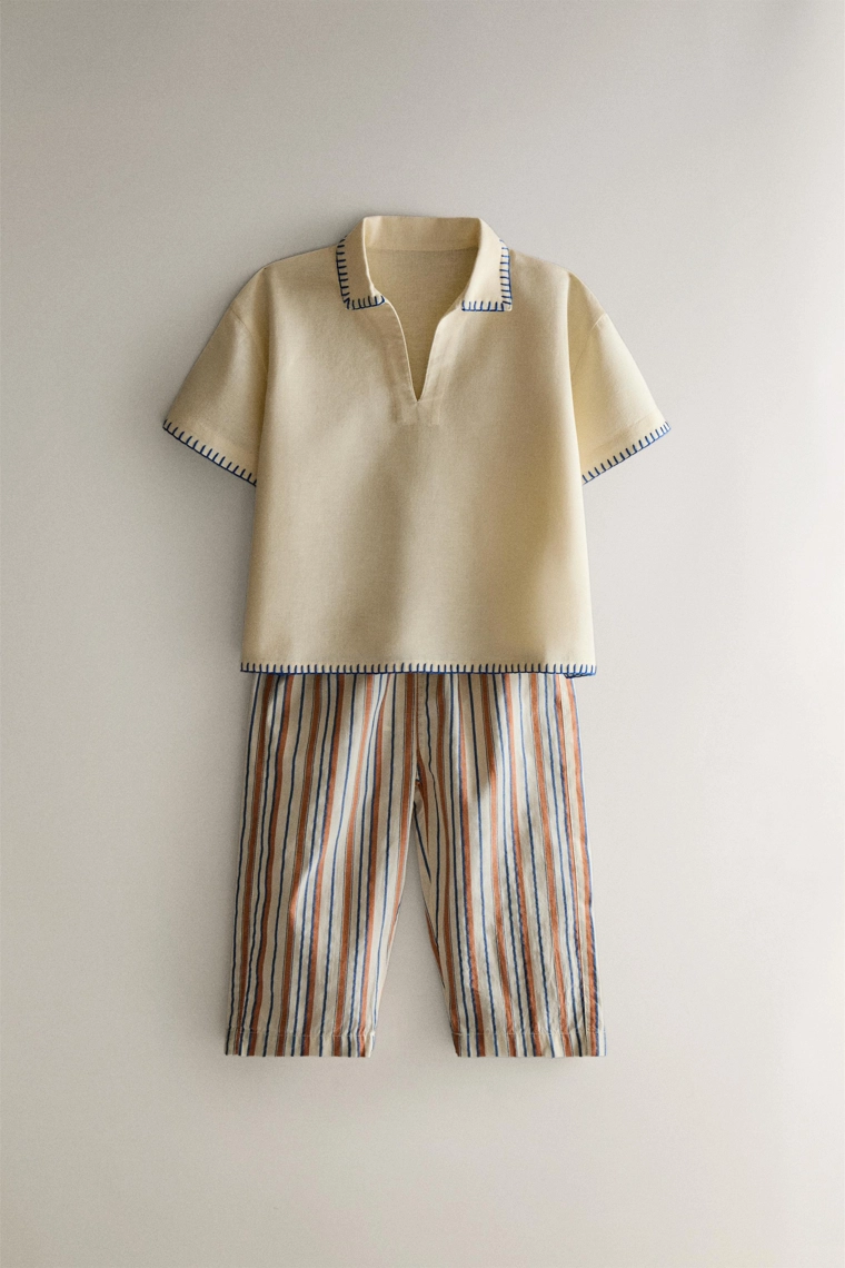 Детское пляжное поло с вышивкой stitch