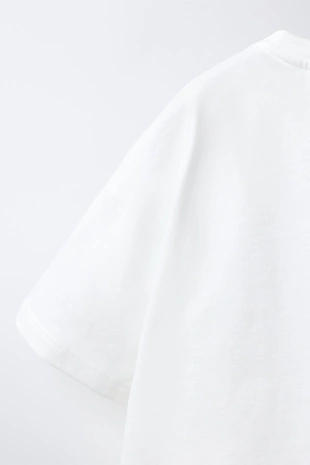 Футболка с вязаными цветами крючком- Заказать в России