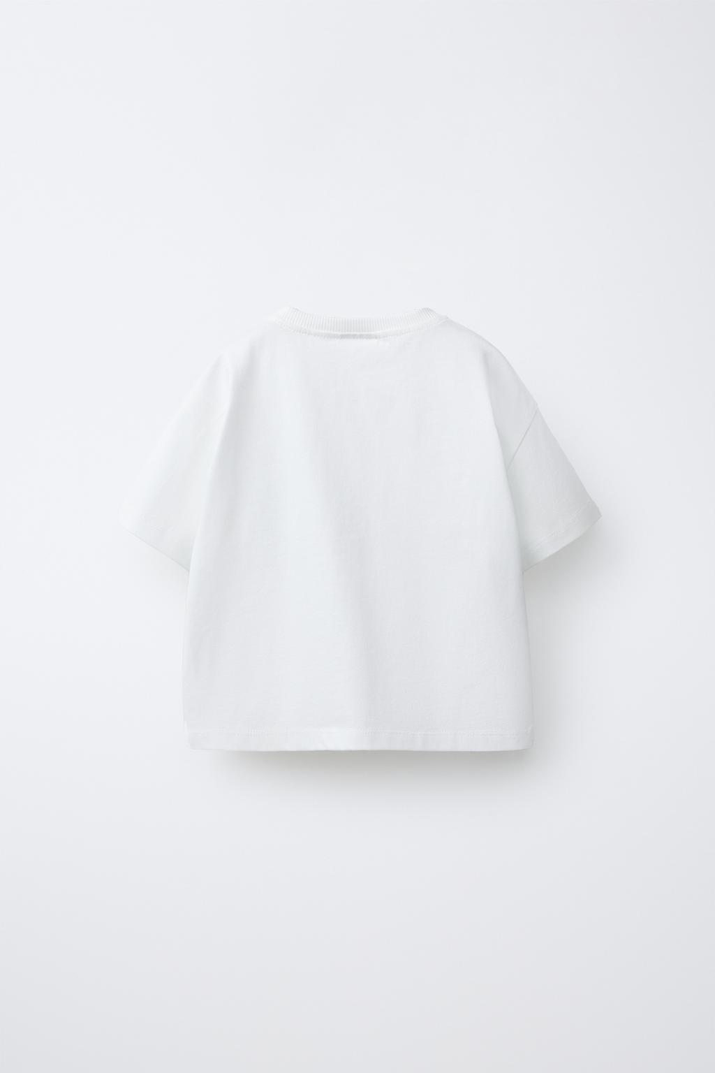 ФУТБОЛКА С ВОЛНИСТЫМ КАРМАНОМ