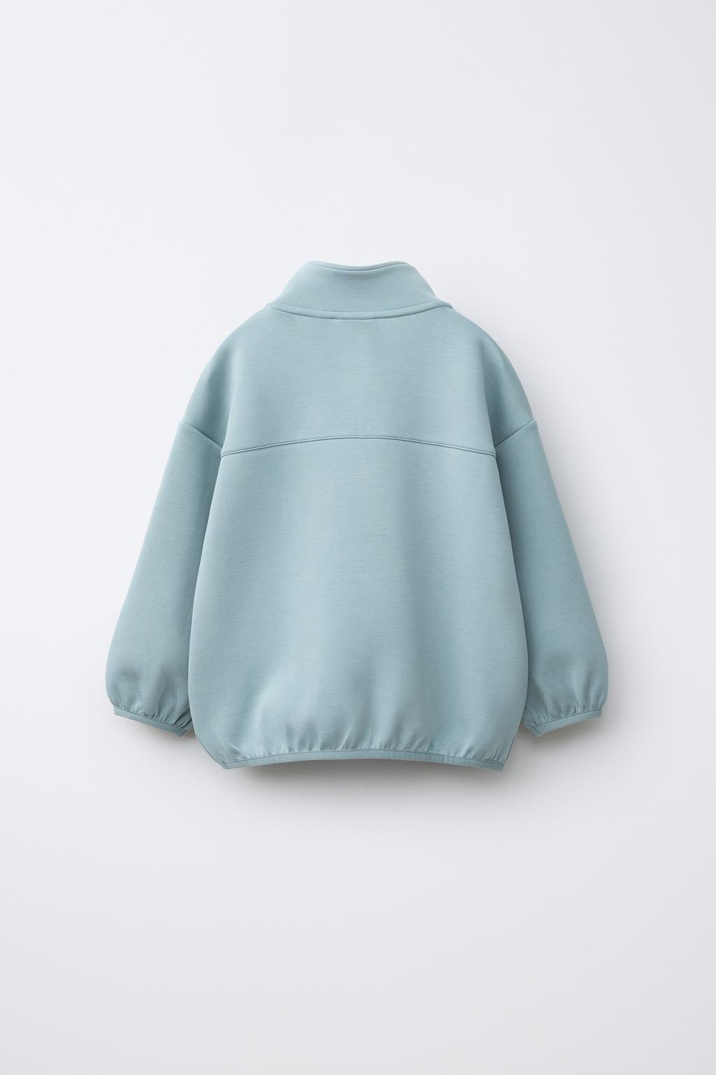 ТОЛСТОВКА ИЗ ИНТЕРЛОКА С НАШИВКОЙ