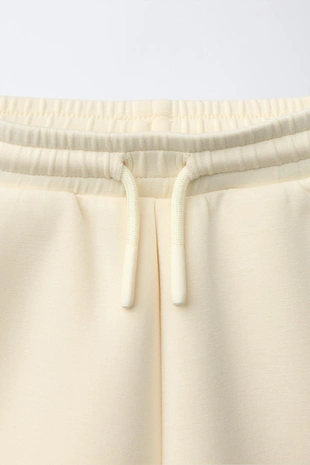 Шорты-бермуды интерлок с этикеткой