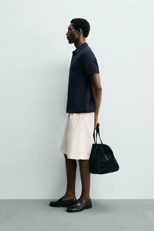 Поло свободного кроя из рельефной ткани