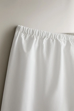 Хлопковые брюки с кружевными оборками- Заказать в России