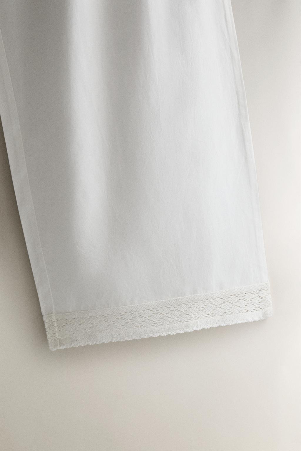 Хлопковые брюки с кружевными оборками