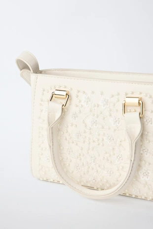 Сумка с плечевым ремнем и жемчужными деталями- Заказать в России