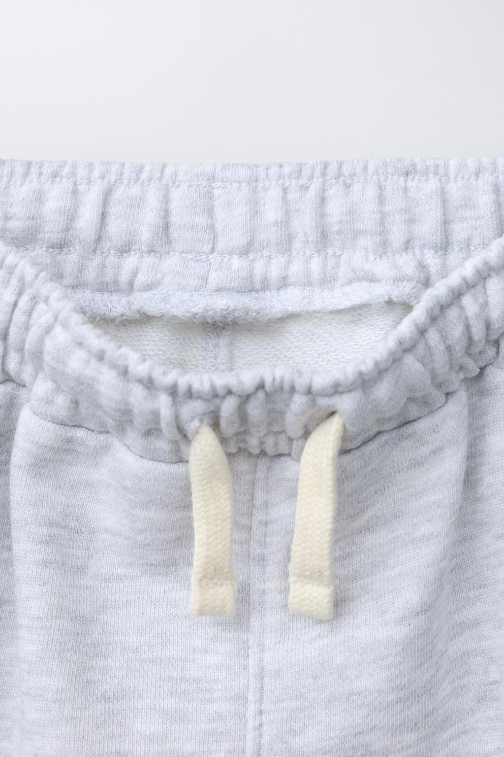 БРЮКИ  С ЭТИКЕТКОЙ