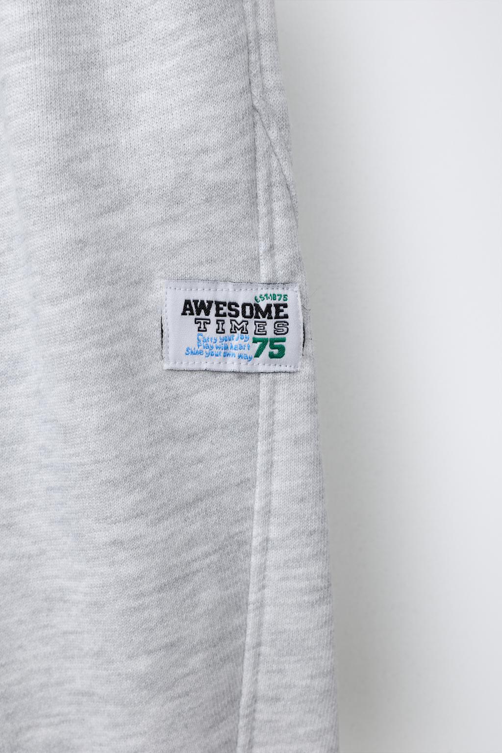 БРЮКИ  С ЭТИКЕТКОЙ