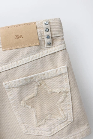 Джинсовые шорты с заклепками и звездами- Заказать в России