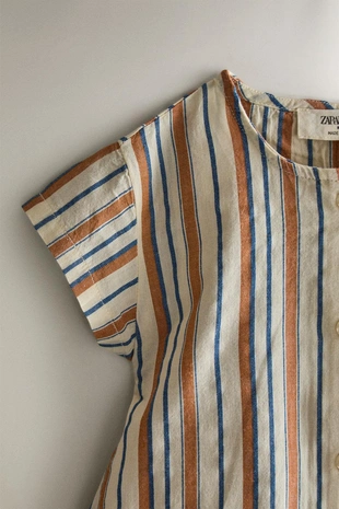 Детский комбинезон с клетчатым узором- Заказать в России