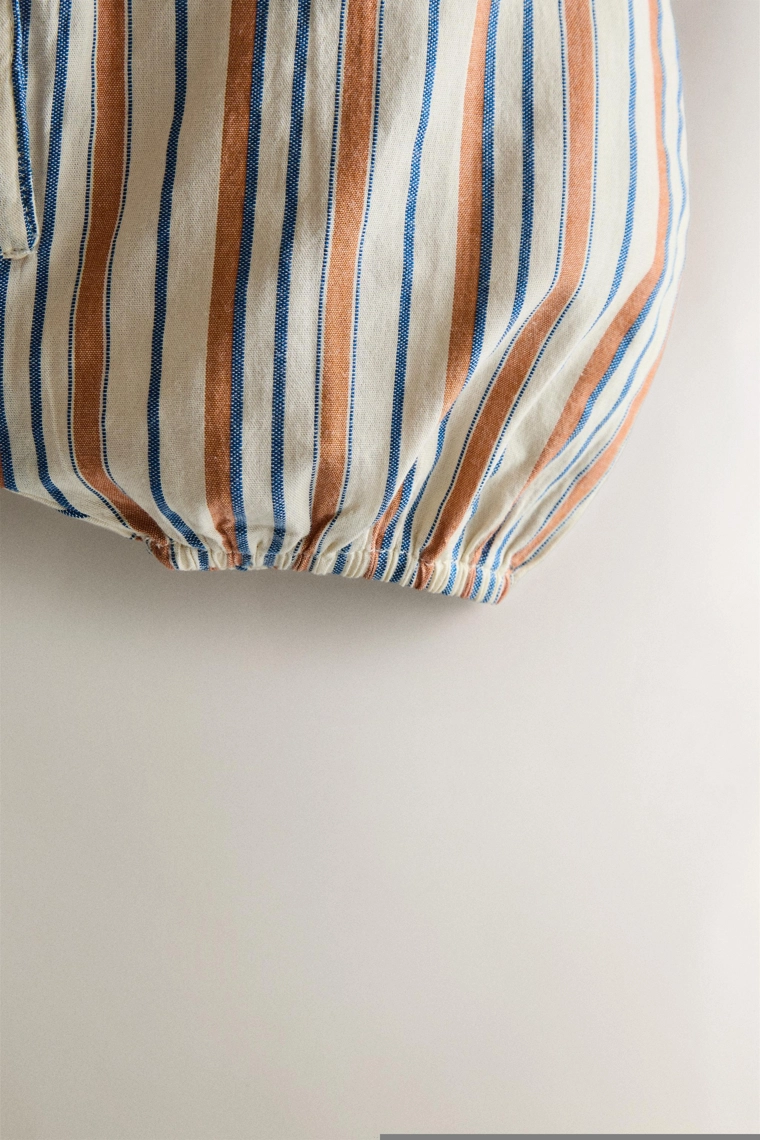 Полосатый комбинезон для младенцев