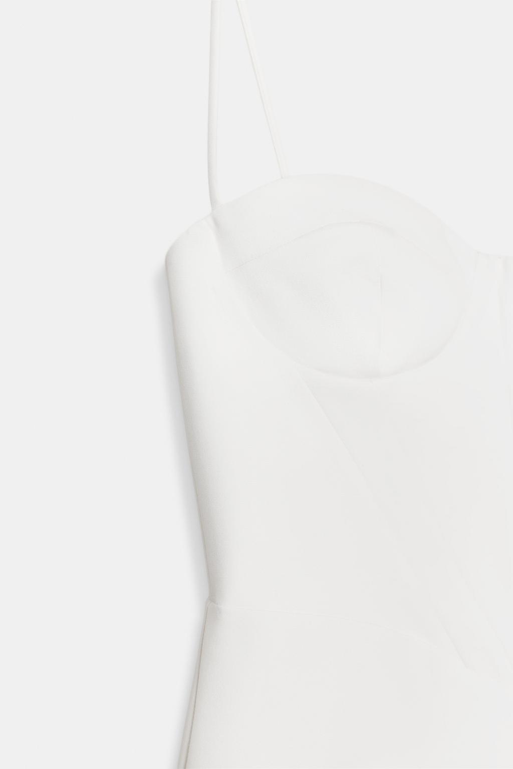 МИНИ-ПЛАТЬЕ НА БРЕТЕЛЯХ