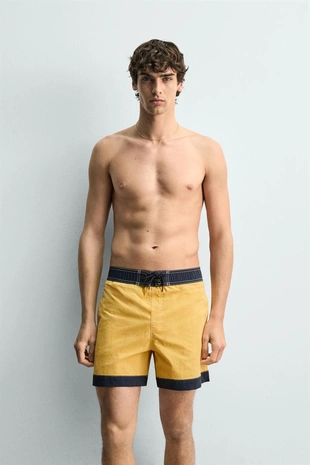 Длинные плавки с контрастными деталями- Заказать в России