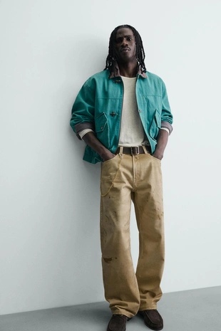 Брюки прямого кроя с эффектом потертости- Заказать в России