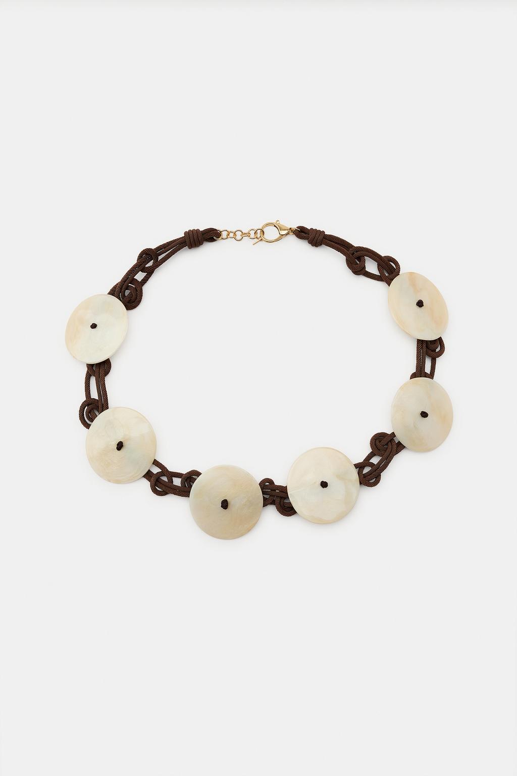 РЕМЕНЬ-ШНУРОК С ДИСКАМИ ИЗ СМОЛЫ