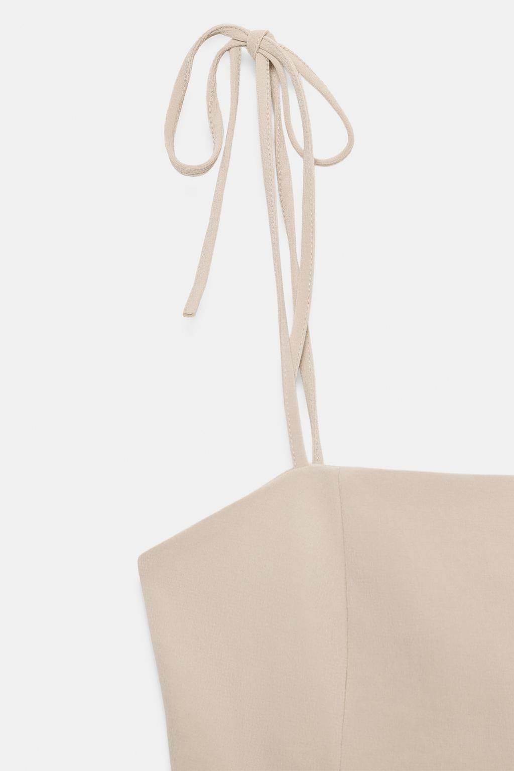 ТОП С БАСКОЙ НА БРЕТЕЛЯХ