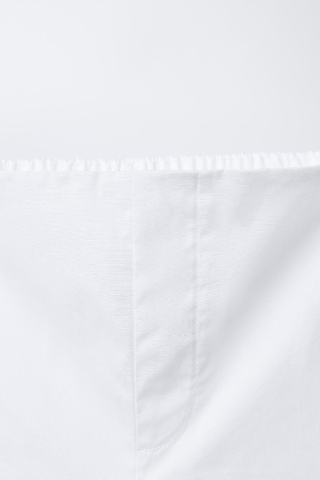 БЕРМУДЫ ИЗ ПОПЛИНА С ВЫШИТЫМ ЦВЕТКОМ