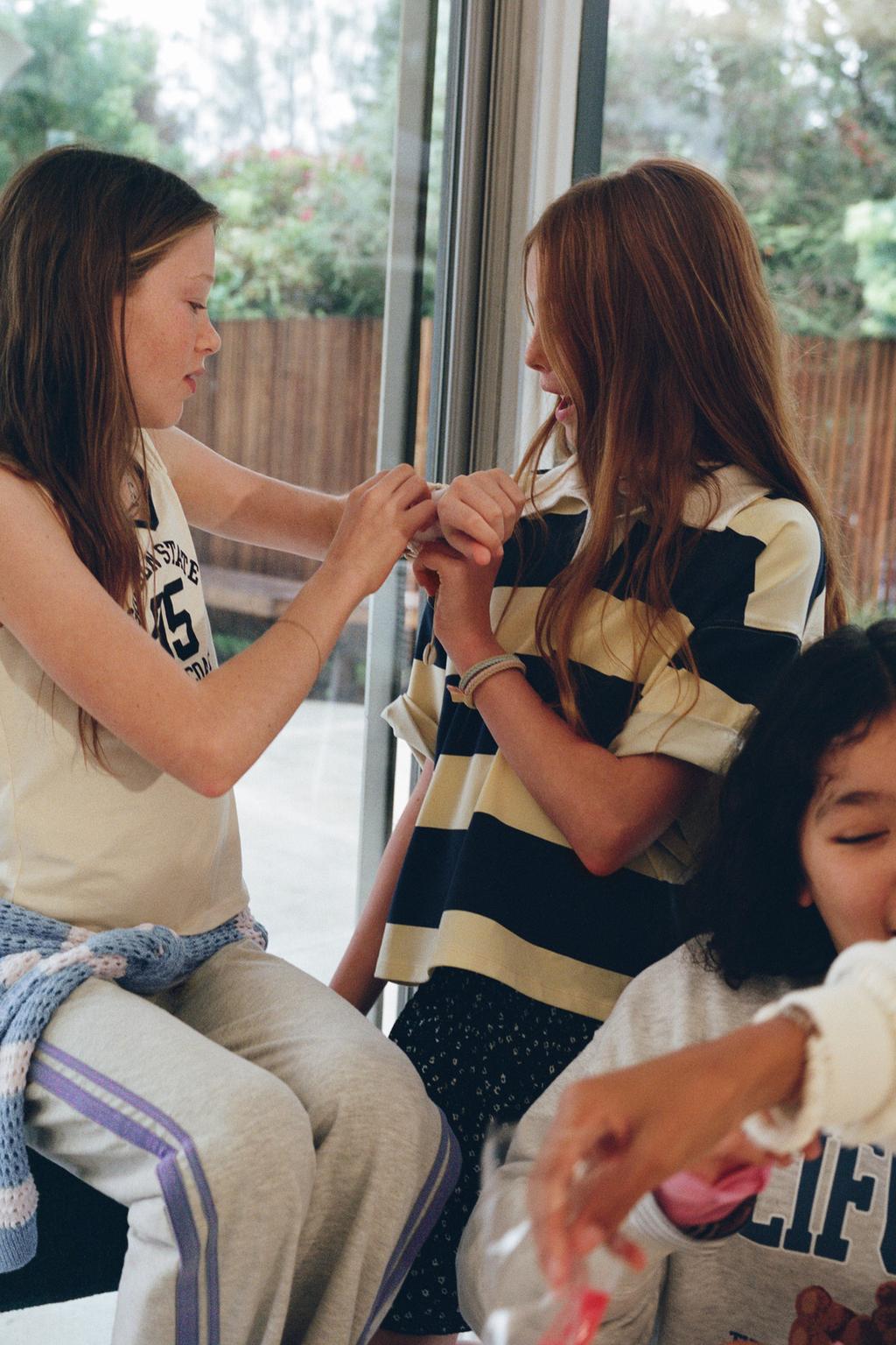 РАСКЛЕШЕННЫЕ ЛЕГИНСЫ С ЛАМПАСАМИ